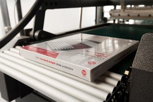 Roller exit table provides a smooth transition from the seal area to the shrink tunnel.